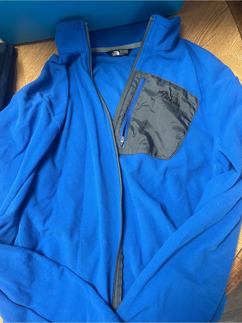 The North Face Men's Royal Blue Fleece Jacket with grey Chest Pocket
